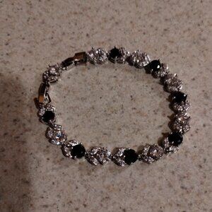 VINTAGE MONET ADJUSTABLE ONYX AND RINESTONE TENNIS BRACELET
